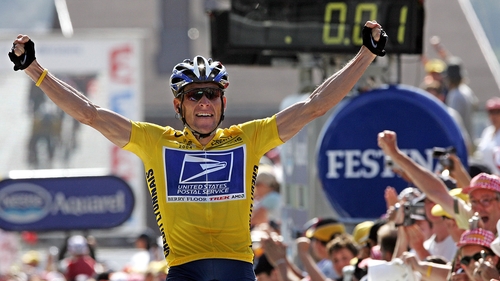 Lance Armstrong celebrates winning the Tour de France in 2004, a victory of which he would later be stripped