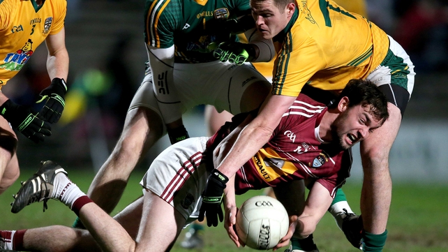 Meath's Bryan Menton and Daragh Daly of Westmeath battle for the ball