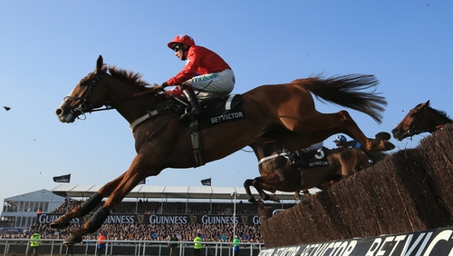Jamie Moore partnered Sire De Grugy to victory in last year's Champion Chase