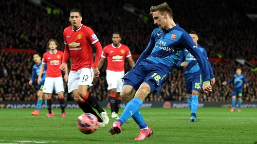 Nacho Monreal scores the opening goal in Arsenal's quarter-final win at Old Trafford