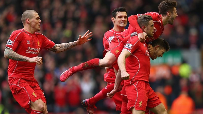 Jordan Henderson is mobbed following his recent goal against Manchester City at Anfield