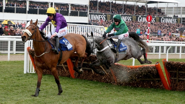 Windsor Park and Davy Russell jump the last in front on their way to winning the Neptune