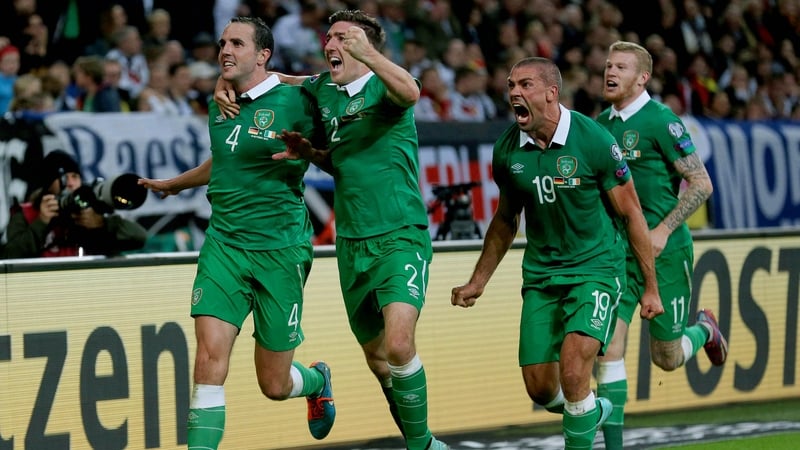 Republic of Ireland's John O'Shea celebrates scoring against Germany with Stephen Ward, Jonathan Walters and James McClean