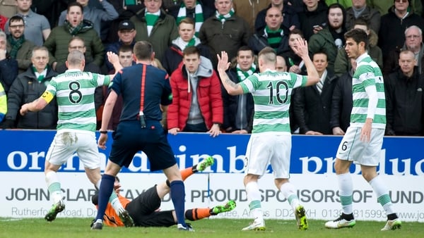 Anthony Stokes reacts after tackling Dundee United's Sean Dillon during the Scottish Cup quarter-final