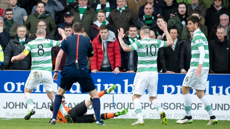 Anthony Stokes reacts after tackling Dundee United's Sean Dillon during the Scottish Cup quarter-final