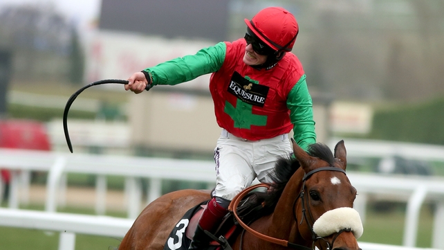 Sam Twiston-Davies celebrates winning the Queen Mother Champion Chase on Dodging Bullets at Cheltenham on Wednesday
