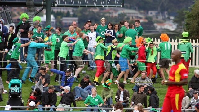 Ireland fans celebrate winning against Zimbabwe in the Cricket World Cup on Saturday