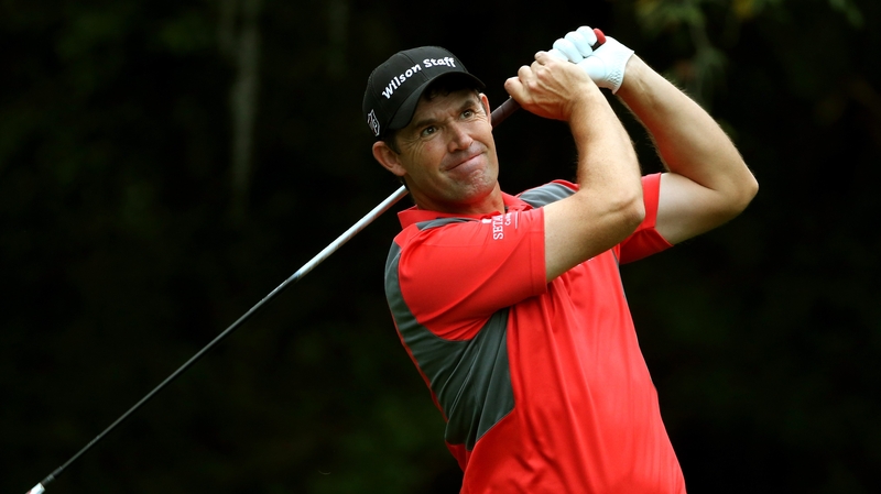 Padraig Harrington watches his shot go wayward from the 11th tee