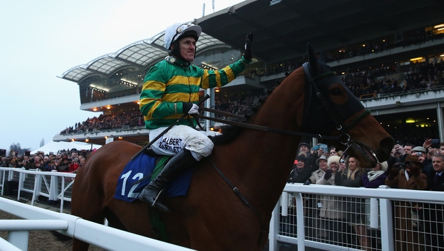 Tony McCoy salutes the crowd after his final ride at the Cheltenham Festival
