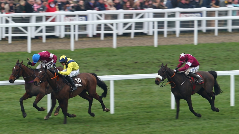 Bryan Cooper (R) riding No More Heroes in the Albert Bartlett Novices Hurdle
