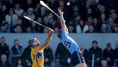 Dublin's Mark Schutte wins the ball ahead of Brendan Bugler