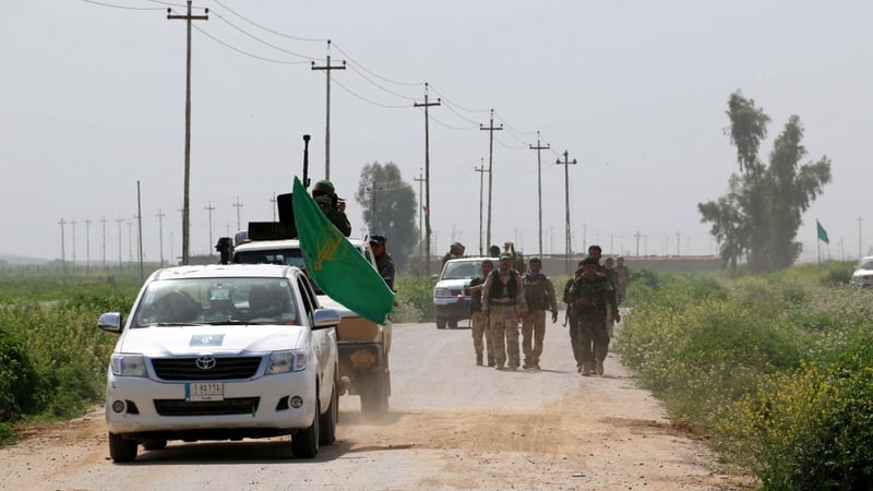 Kurdish peshmerga soldiers took soil and clothing samples after an IS suicide bombing in northern Iraq in January
