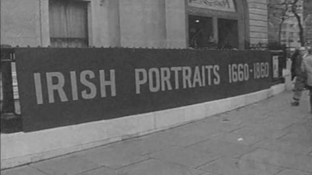 The front of the National Portrait Gallery London with the banner advertising the Irish Portraits exhibition