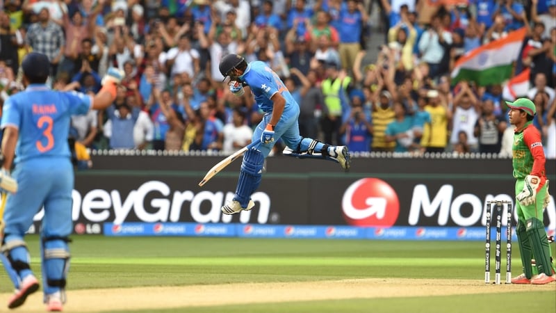 Rohit Sharma celebrates his century during India's win over Bangladesh