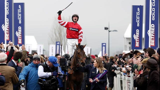 Coneygree and Nico de Boinville make their way to the winners' enclosure after the novice recorded a remarkable front-running victory in the Gold Cup at Cheltenham