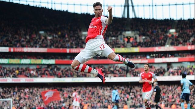 Olivier Giroud celebrates scoring Arsenal's opener in the Gunners' 3-0 victory against West Ham at Emirates Stadium