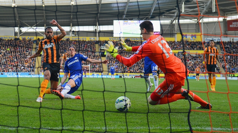 Elmohamady shoots past Chelsea goalkeeper Thibaut Courtois to score Hull's first goal