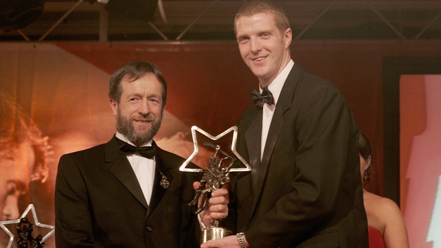 Receiving one of his 11 All Star awards from then GAA President Sean Kelly in 2004