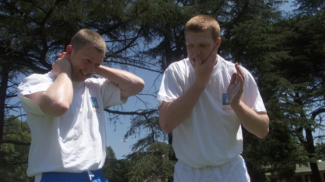 With Damien Fitzhenry, slapping on the sun screen during the All Stars trip to Buenos Aires in 2002