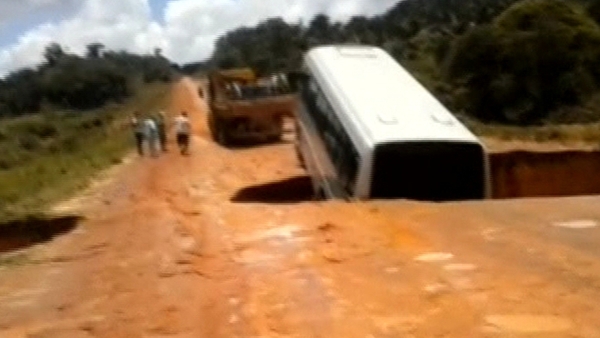 Bus in Brazil falls into crater