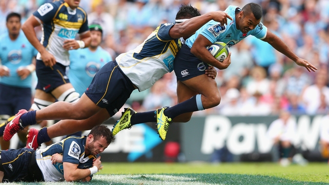 Kurtley Beale of the Waratahs is tackled during the Super Rugby match between the Waratahs and the Brumbies at Allianz Stadium in Sydney