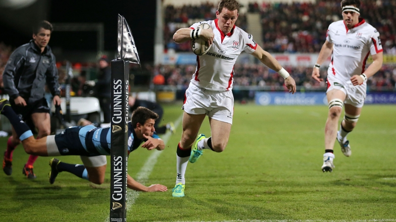 Craig Gilroy runs in Ulster's first try despite Cardiff's Gavin Evans' tackle effort