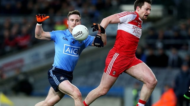 Derry's James Kielt giving a masterclass in modern Gaelic football, where ball possession is sacrificed in favour of running back towards your own goal