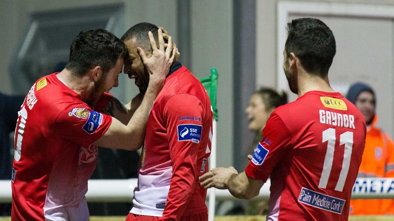 Cork's Kieran Djilali celebrates scoring with Billy Dennehy