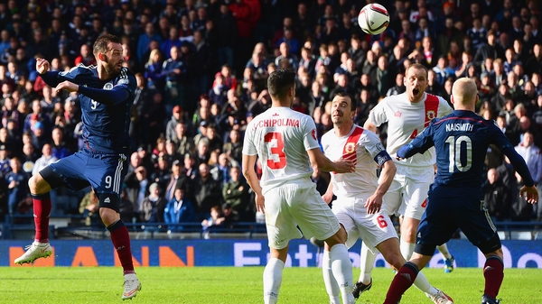 Steven Fletcher (left) heads home the second goal of his hat-trick
