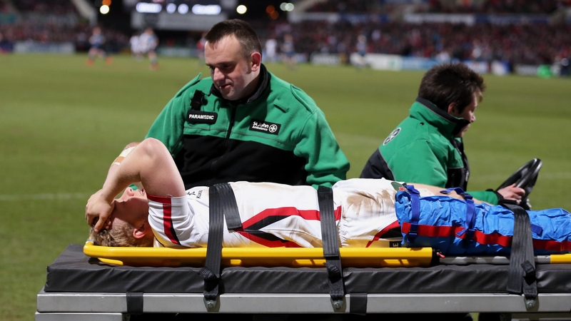 Stuart Olding goes off on a stretcher after the injury sustained against the Cardiff Blues