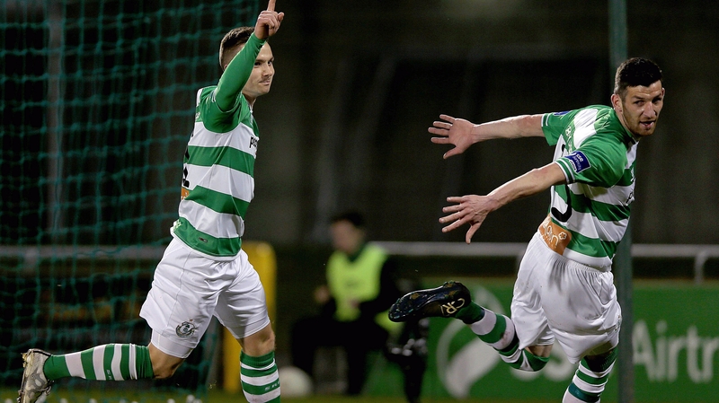 Mikey Drennan of Shamrock Rovers (l) celebrates scoring the opener for the Hoops