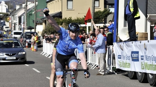 Bryan McCrystal punches the air on winning stage 3 of Ras Mumhan