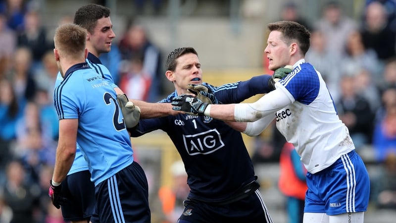 Dublin's Stephen Cluxton separates Jonny Cooper and Conor McManus of Monaghan