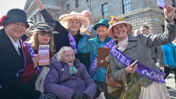 Susan Jackson (age 103, born 20 March 1912) surrounded by women dressed in pre-Rising costumes