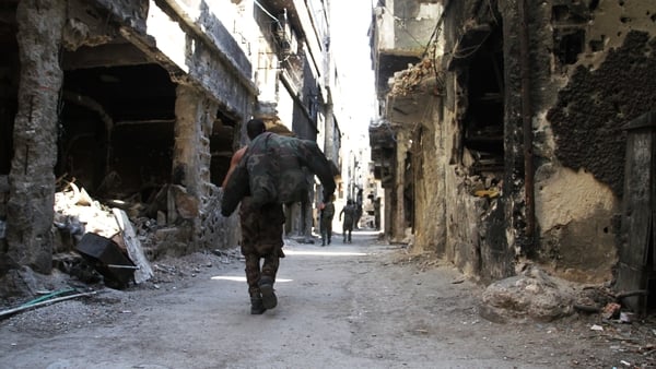 Hundreds of families have been evacuated from the Yarmouk camp near Damascus