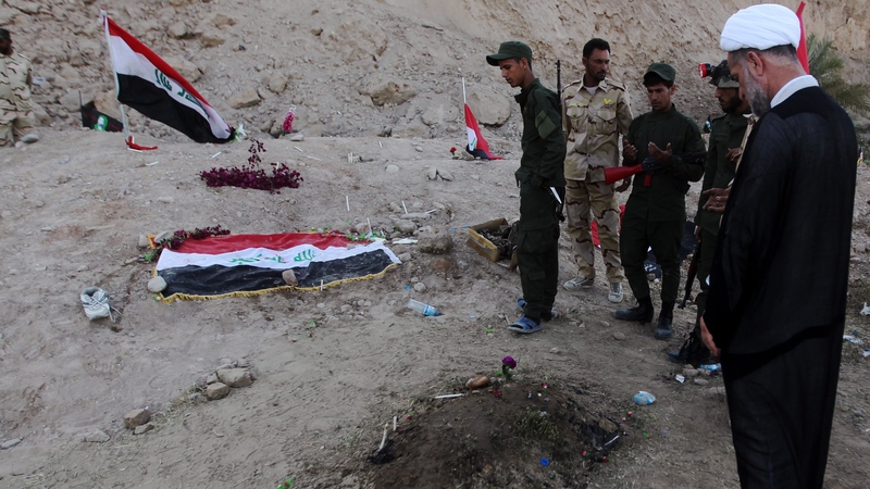 The graves are near the former US base of Camp Speicher