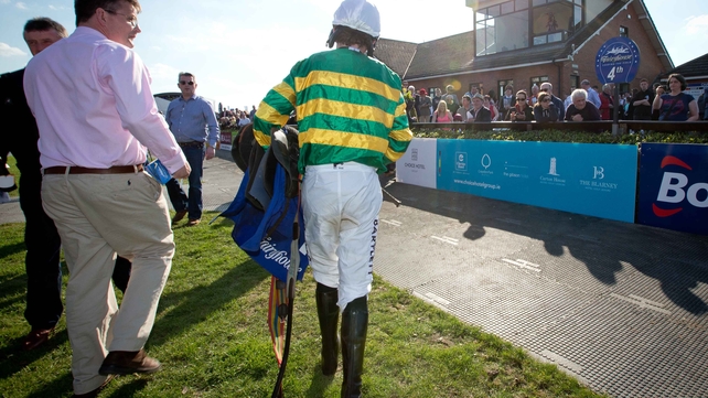 Tony McCoy signed off his career in Ireland with two unplaced rides at Fairyhouse. He's seen here leaving the parade ring as a jockey for the last time in Ireland