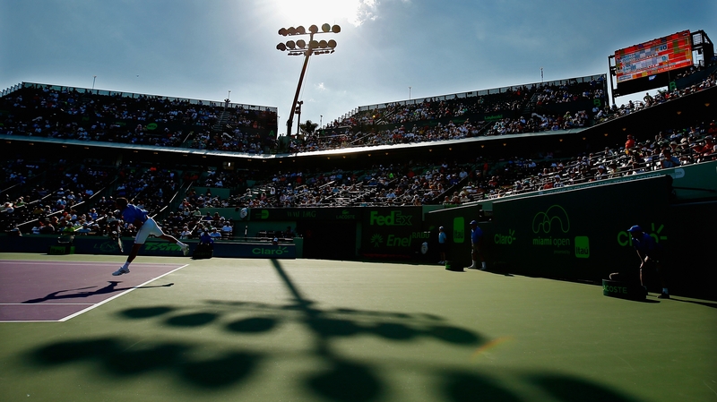 Novak Djokovic of Serbia returns the ball against Steve Darcis of Belgium during day 8 of the Miami Open at Crandon Park Tennis Centre