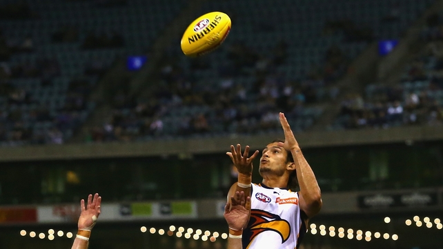 Sharrod Wellingham of the Eagles leaps to take a mark during the round one AFL match between the Western Bulldogs and the West Coast Eagles at Etihad Stadium