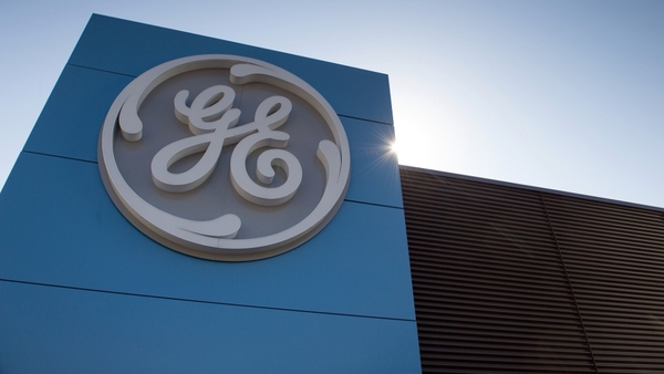 General Electric said its total quarterly revenue rose to $30.1 billion from $29.1 billion.