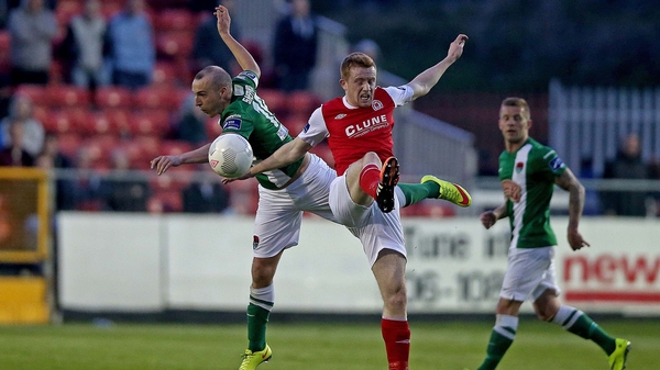 Karl Sheppard of Cork with Sean Hoare of St Pat's