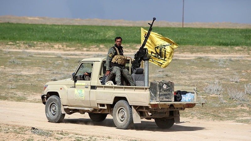 A Shia paramilitary group threatened journalist Ned Parker