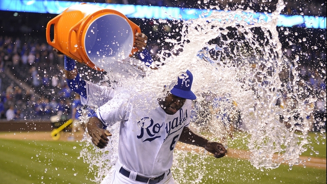 Lorenzo Cain of the Kansas City Royals is doused with water after a 7-5 win over the Chicago White Sox at Kauffman Stadium in Kansas City
