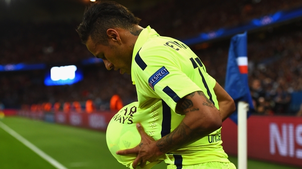 Neymar celebrates scoring the opening goal