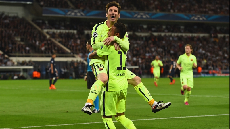 Lionel Messi celebrates with Neymar following his first half strike