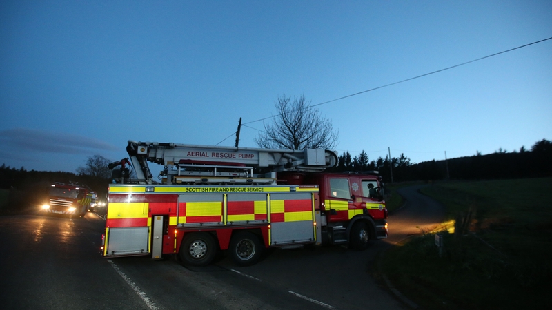 A Scottish Fire and Rescue Service vehicles arrive at the entrance to High Craigton Farm