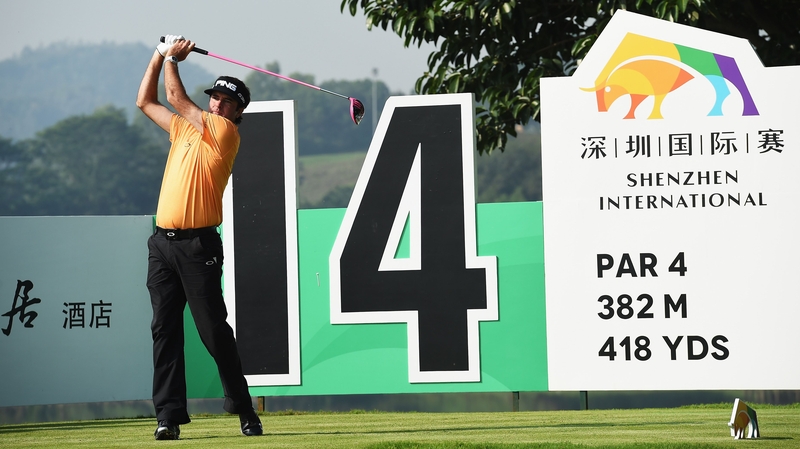 Bubba Watson tees off at the 14th
