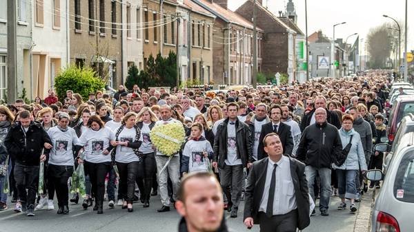 Chloe's mother led the march along with the mayor of Calais and relatives