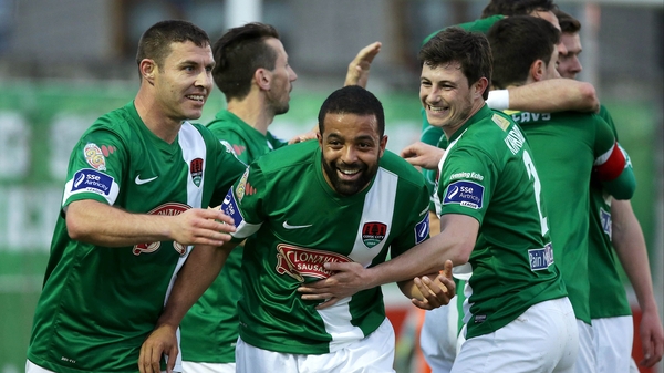 Cork's Kieran Djilali is mobbed by team mates following his goal