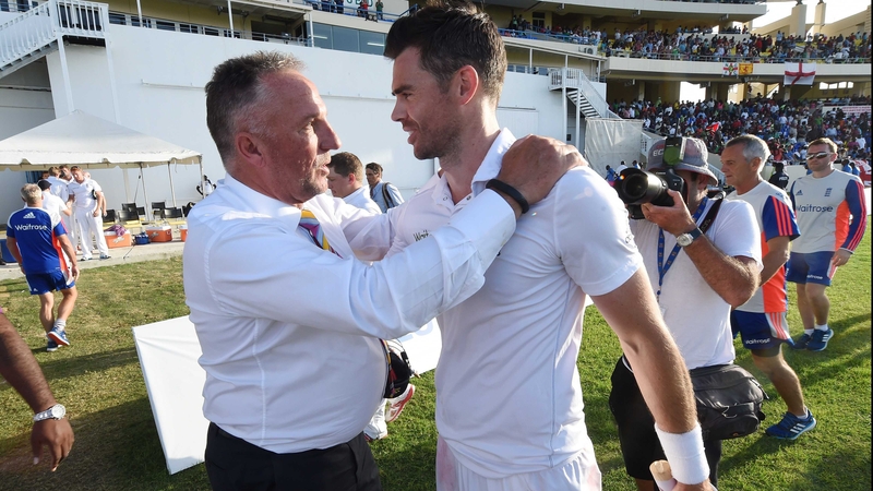 Ian Botham congratulates James Anderson after the Lancashire bowler eclipsed his wicket-taking record